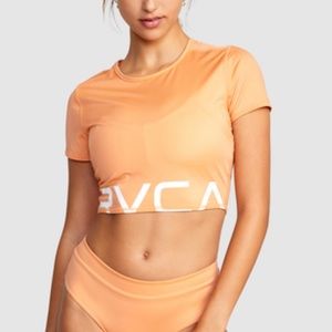 RVCA wilder cropped rash guard (color: burnt coral) Size: small. New w/ tags